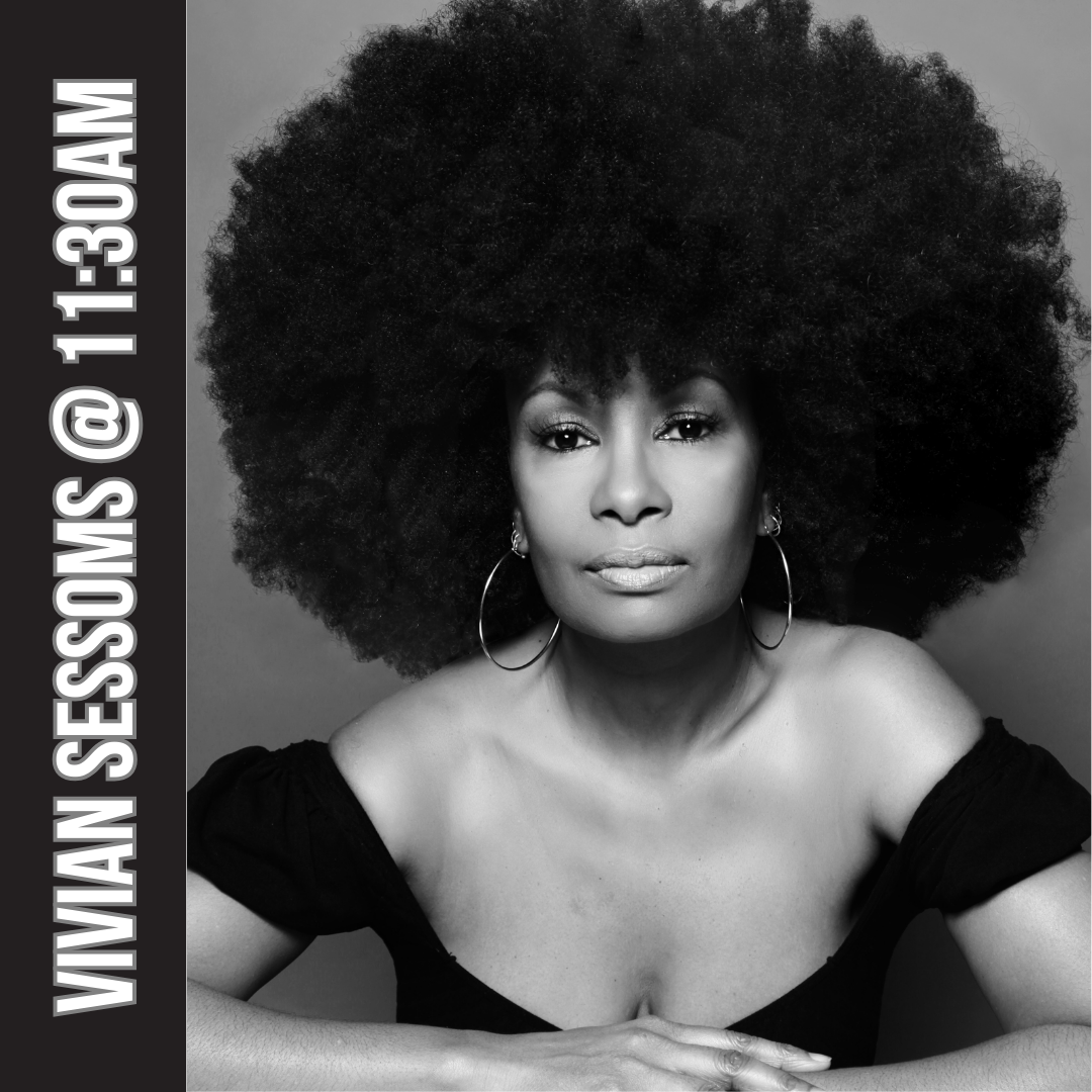 Vivian Sessoms leans in, looking cool and confident in a black and white photo.